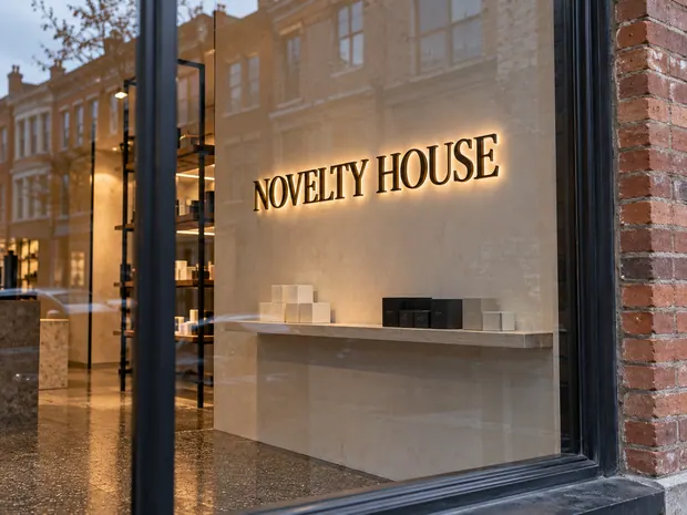 Illustrative custom metal sign concept: Novelty House Through Reflections