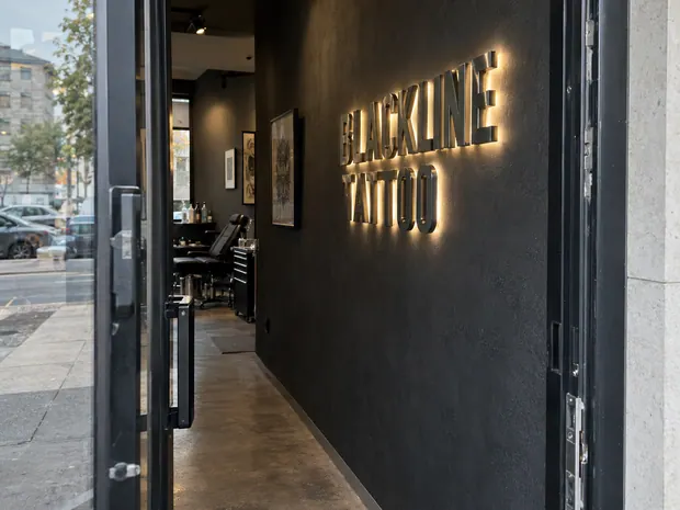 Illustrative custom metal sign concept: Blackline Tattoo Studio Entrance